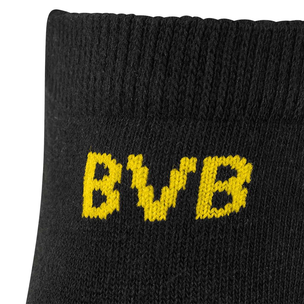 Black Borussia Dortmund socks in a set from Puma with yellow BVB lettering—perfect for fans.