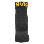 Dreierpack BVB Socken von Puma in Schwarz mit gelbem BVB-Logo am Bund. Offizielles Merchandise von Borussia Dortmund für Fans.