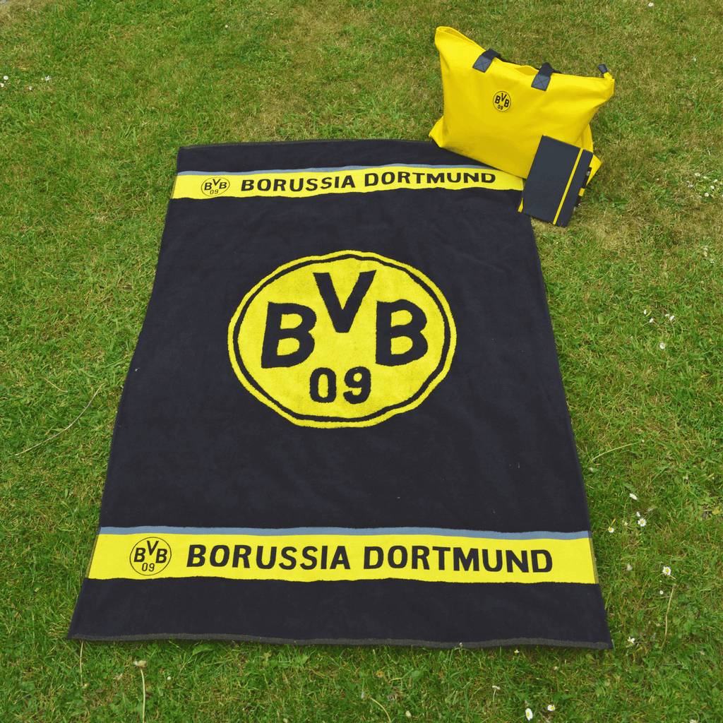 Black-and-yellow BVB beach towel with a large BVB emblem, "Borussia Dortmund" lettering, and a convenient design—perfect for fans.