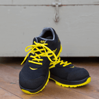 Black-and-yellow BVB Malocher 09 safety shoe, model S3, featuring an eye-catching design, yellow laces, and durable construction for everyday work.