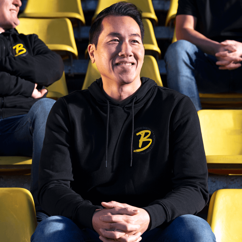 Sweat à capuche noir du BVB pour homme, orné du logo jaune du BVB, idéal pour les supporters au stade ou pour les loisirs.
