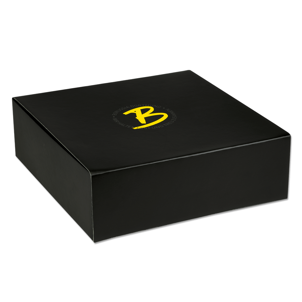 Caja de regalo negra con el logotipo «B» amarillo y la inscripción «Borussia Dortmund», ideal para productos oficiales del BVB y artículos para aficionados.