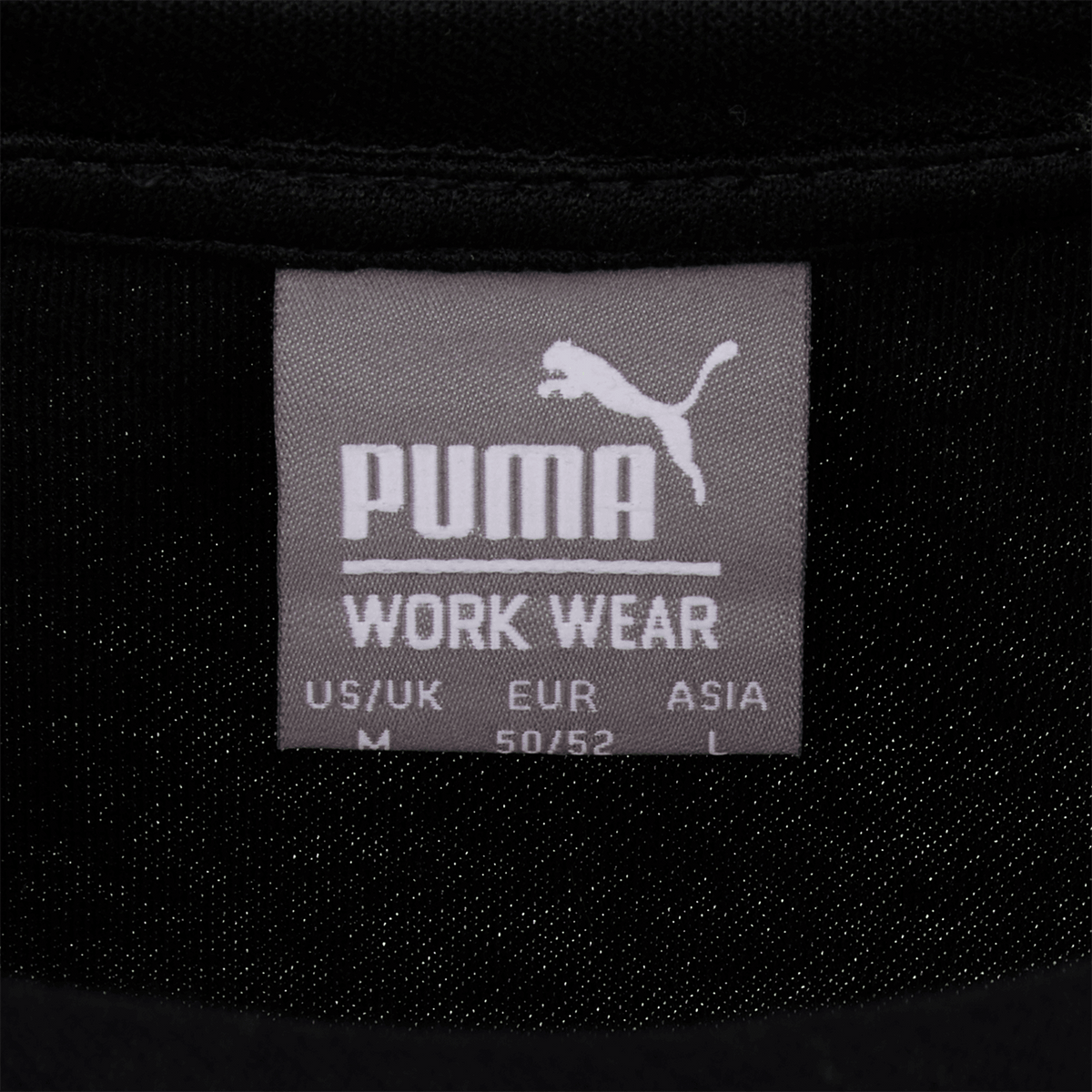 T-shirt de travail noir du BVB, disponible en différentes tailles, fabriqué par Puma, idéal pour les supporters du Borussia Dortmund.