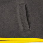 Vue détaillée d'une veste polaire BVB noire et jaune pour bébés et jeunes enfants, avec un gros plan sur la poche.