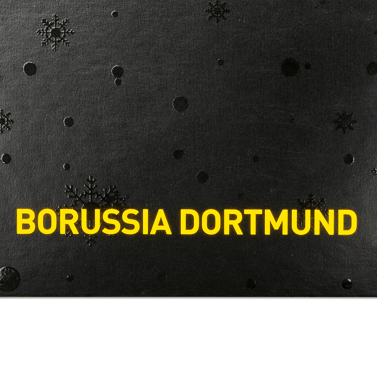 ボルシア・ドルトムントの黒いクリスマスカード。黄色の「Borussia Dortmund」の文字と、エンボス加工された雪の結晶の模様が施されており、ファンアイテムやプレゼントに最適です。