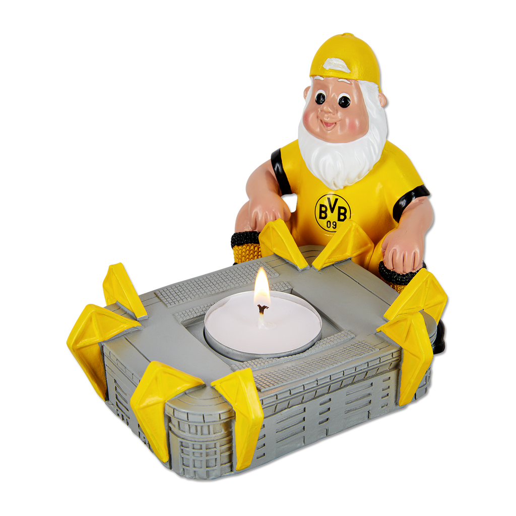 Ein BVB-Gartenzwerg in schwarzgelbem Trikot mit BVB-Logo, der einen Teelichthalter in Form des SIGNAL IDUNA PARK präsentiert. Perfektes Borussia Dortmund Fan-Accessoire.