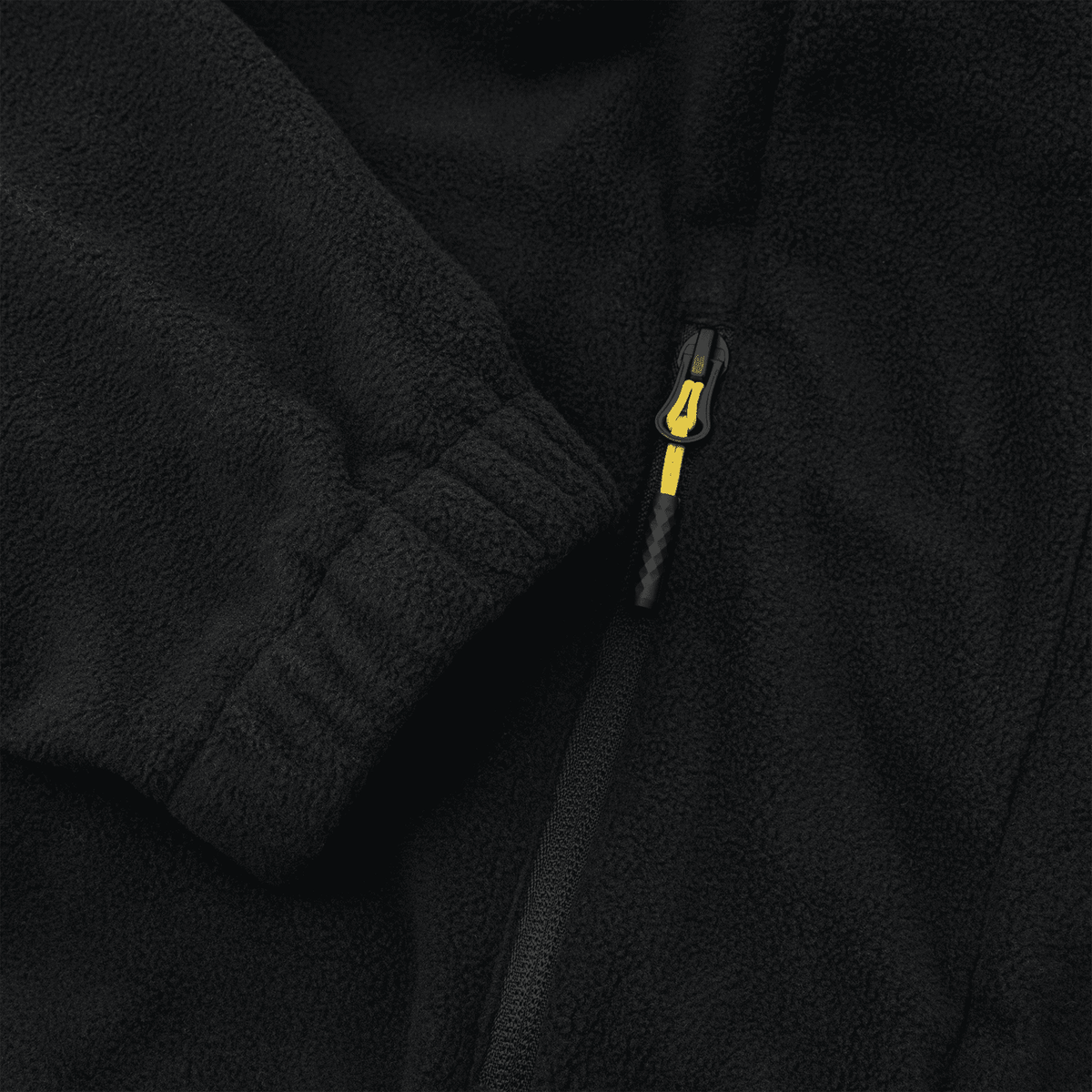 Veste polaire noire du BVB avec une fermeture éclair jaune, idéale pour les supporters du Borussia Dortmund.