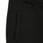 Pantalon de survêtement noir du BVB pour femme, vue détaillée avec poche apparente, issu de la collection Est. 1909.