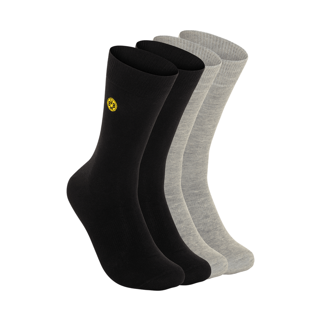 La imagen muestra un pack de 2 pares de calcetines «BVB Business» en negro y gris con el logotipo del BVB, ideales para los aficionados del Borussia Dortmund.