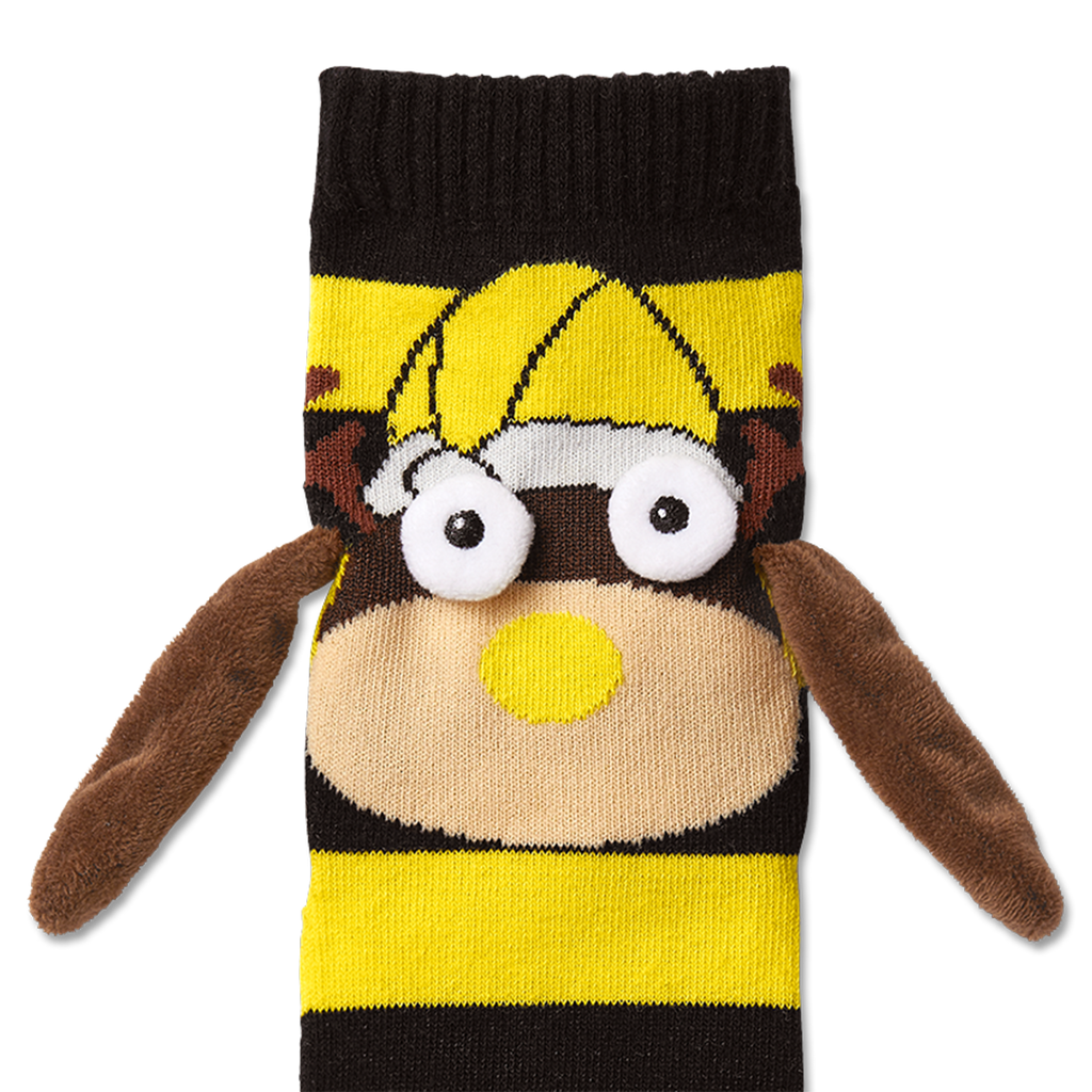 Chaussettes d'amitié noir et jaune du BVB, avec un motif EMMA et des détails en peluche toute douce, un article pour les supporters du Borussia Dortmund.