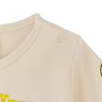 Beige BVB baby and toddler T-shirt featuring the "Save the Bees" design, with a black-and-yellow BVB logo, made from sustainable material, and practical snap buttons on the shoulder.