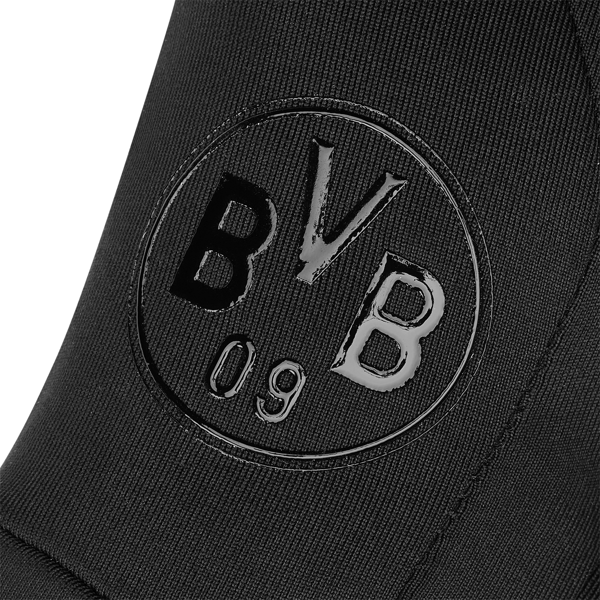 Detailaufnahme der schwarzen BVB Funktionshandschuhe für Kinder mit geprägtem BVB 09-Logo. Ideal für junge Fans von Borussia Dortmund.