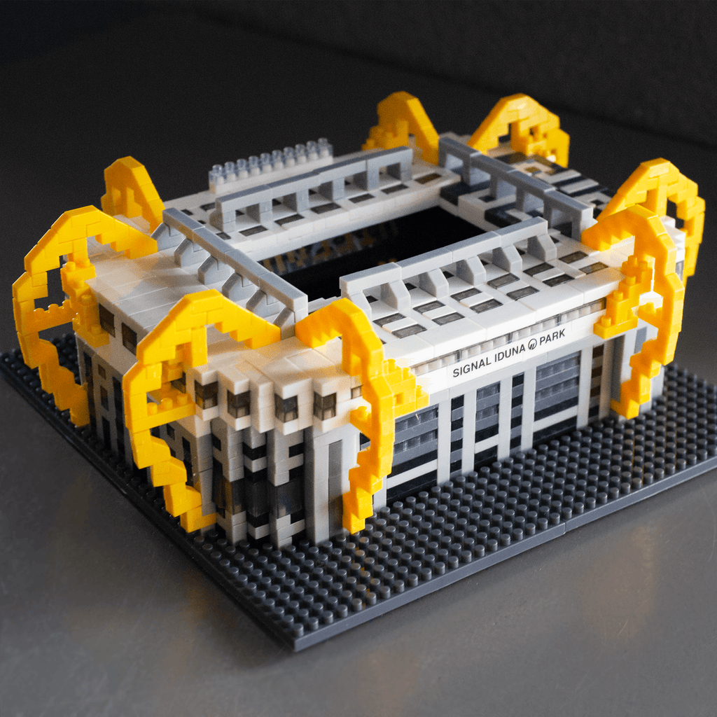 Mini-maquette du SIGNAL IDUNA PARK, le stade emblématique du Borussia Dortmund, aux couleurs noir et jaune et aux détails soignés. Idéale pour les supporters du BVB et les passionnés de modélisme.