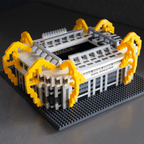 Mini-maquette du SIGNAL IDUNA PARK, le stade emblématique du Borussia Dortmund, aux couleurs noir et jaune et aux détails soignés. Idéale pour les supporters du BVB et les passionnés de modélisme.