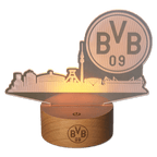 ドルトムントのスカイラインをあしらったモダンなBVB LEDライト。スタイリッシュな木製台座に載っています。ファンにとって、装飾用照明として最適です。