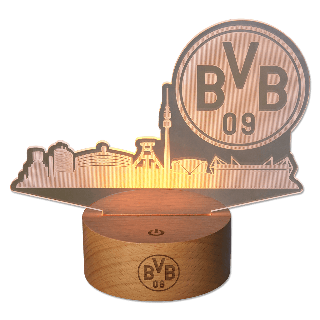 Lampe LED moderne du BVB représentant la silhouette de Dortmund, posée sur un élégant socle en bois. Idéale pour les supporters comme éclairage décoratif.