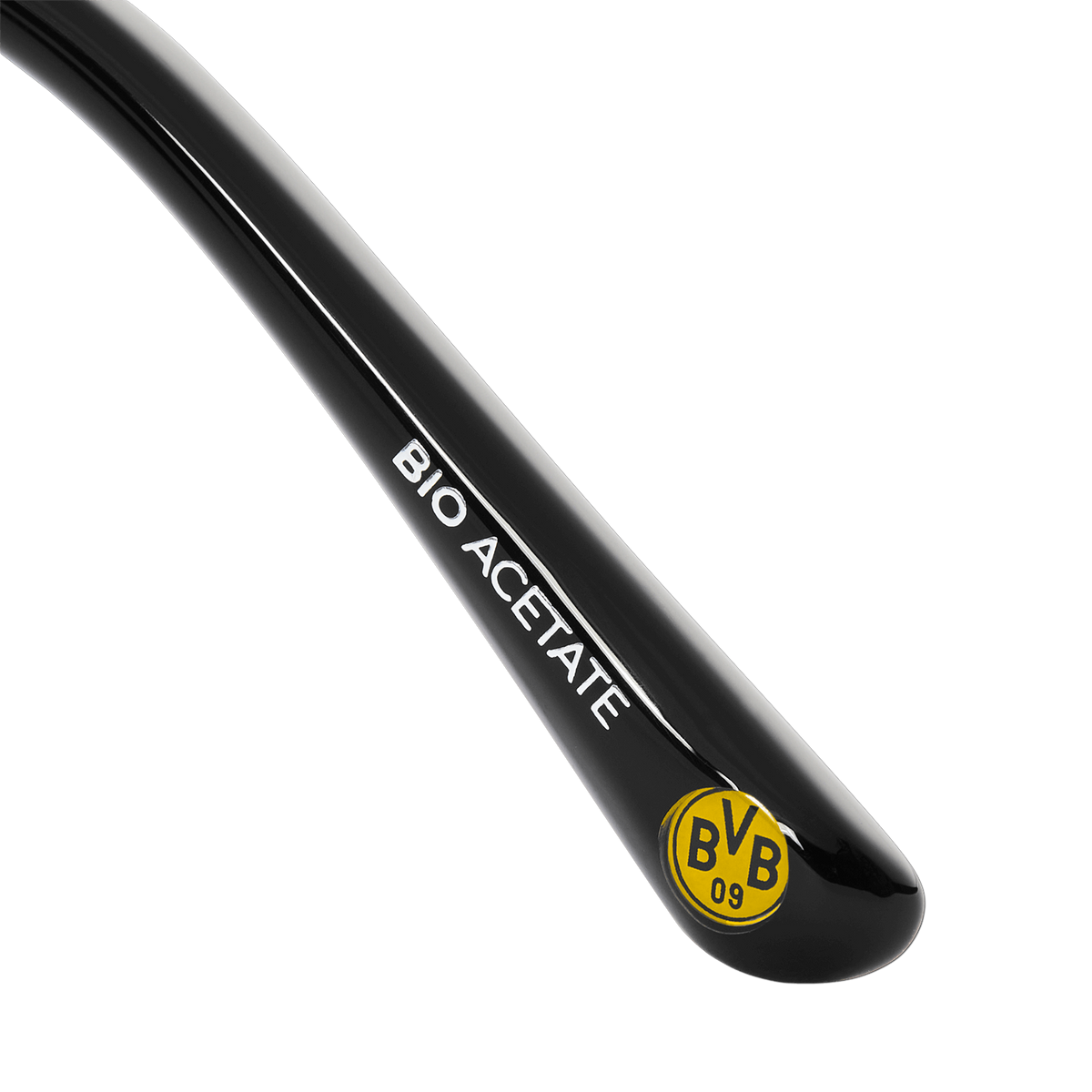 Patilla negra para gafas fabricada en acetato ecológico sostenible, con el logotipo amarillo del BVB y la inscripción «Bio Acetate», parte de la colección BVB X Kapten & Son Nairobi All Black.