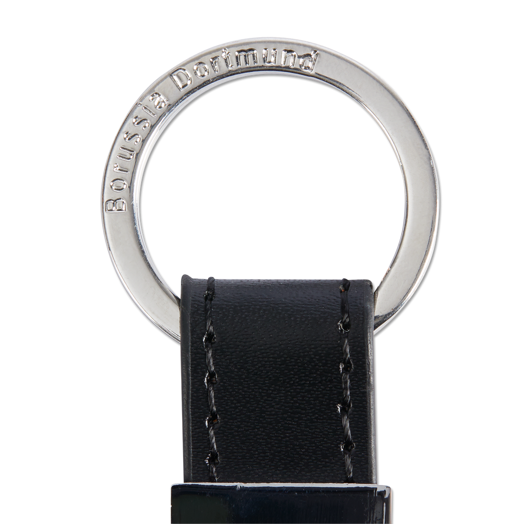 High-quality BVB keychain with a metal ring and black leather, engraved with the Borussia Dortmund logo. The perfect accessory for fans.
