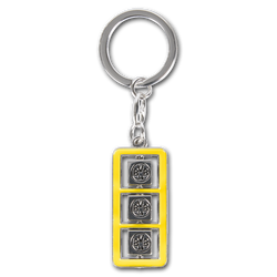 Borussia Dortmund keychain with a yellow frame and three black-and-silver cubes featuring the BVB logo.