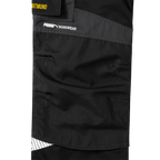 Close-up of the black-gray BVB work pants 23/24 with the PUMA logo and "Workwear" lettering, part of the current Borussia Dortmund collection.
