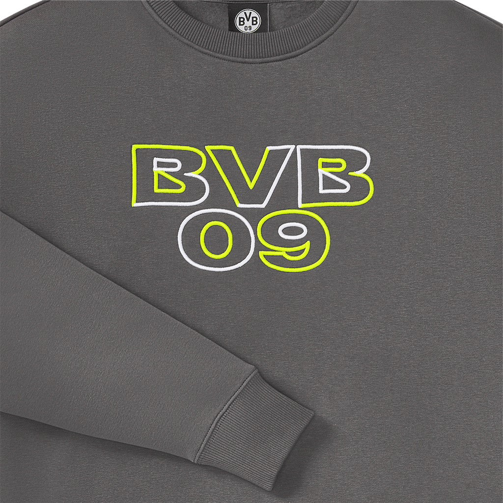 Maglia da donna grigia a girocollo con logo BVB 09 e dettagli neon, ideale per i tifosi del Borussia Dortmund.