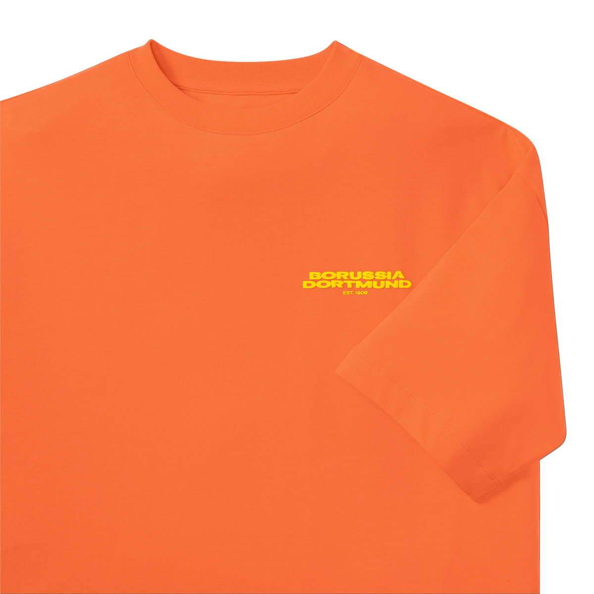 Camiseta «BVB Urban» de color naranja con el logotipo amarillo del Borussia Dortmund en el pecho izquierdo, de manga corta, artículo para los seguidores del Borussia Dortmund.