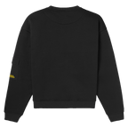 Pull à col rond noir du BVB vu de dos, avec l'inscription « Borussia Underground » en jaune sur la manche : un produit dérivé idéal pour les fans.