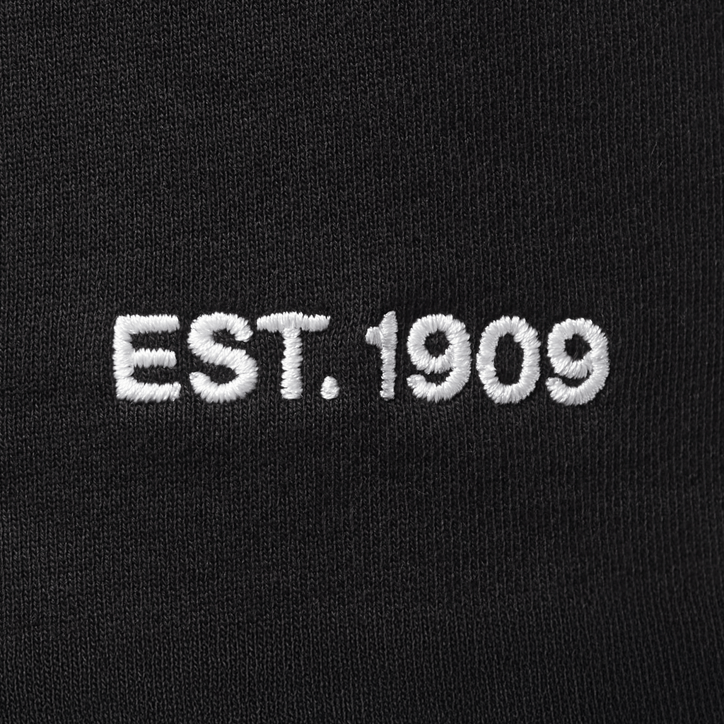 Short noir du BVB pour femme, avec l'inscription « EST. 1909 » imprimée en blanc sur le tissu.
