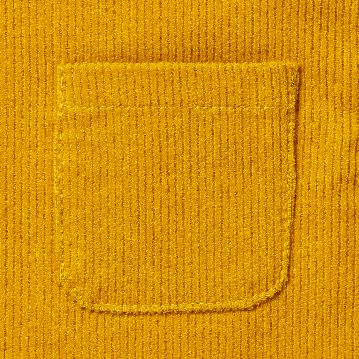 Close-up of yellow corduroy pants for babies and toddlers with a visible pocket, perfect for BVB fans.