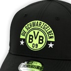 Black BVB cap by New Era with a yellow-green embroidered "Die Schwarzgelben" logo and an adjustable strap.