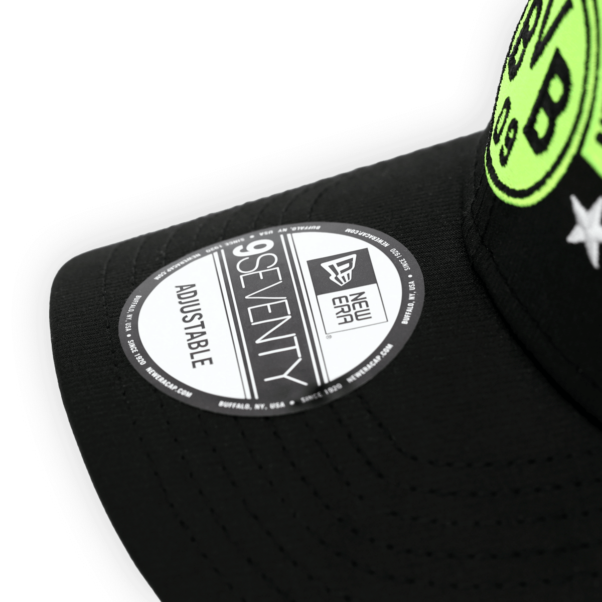 Black BVB cap in a retro design with a green Borussia Dortmund logo, adjustable, and a 9Seventy sticker on the front.