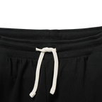 Pantaloni della tuta neri del BVB con effetto color block per bambini, con cordoncini bianchi, vestibilità comoda e design sportivo.