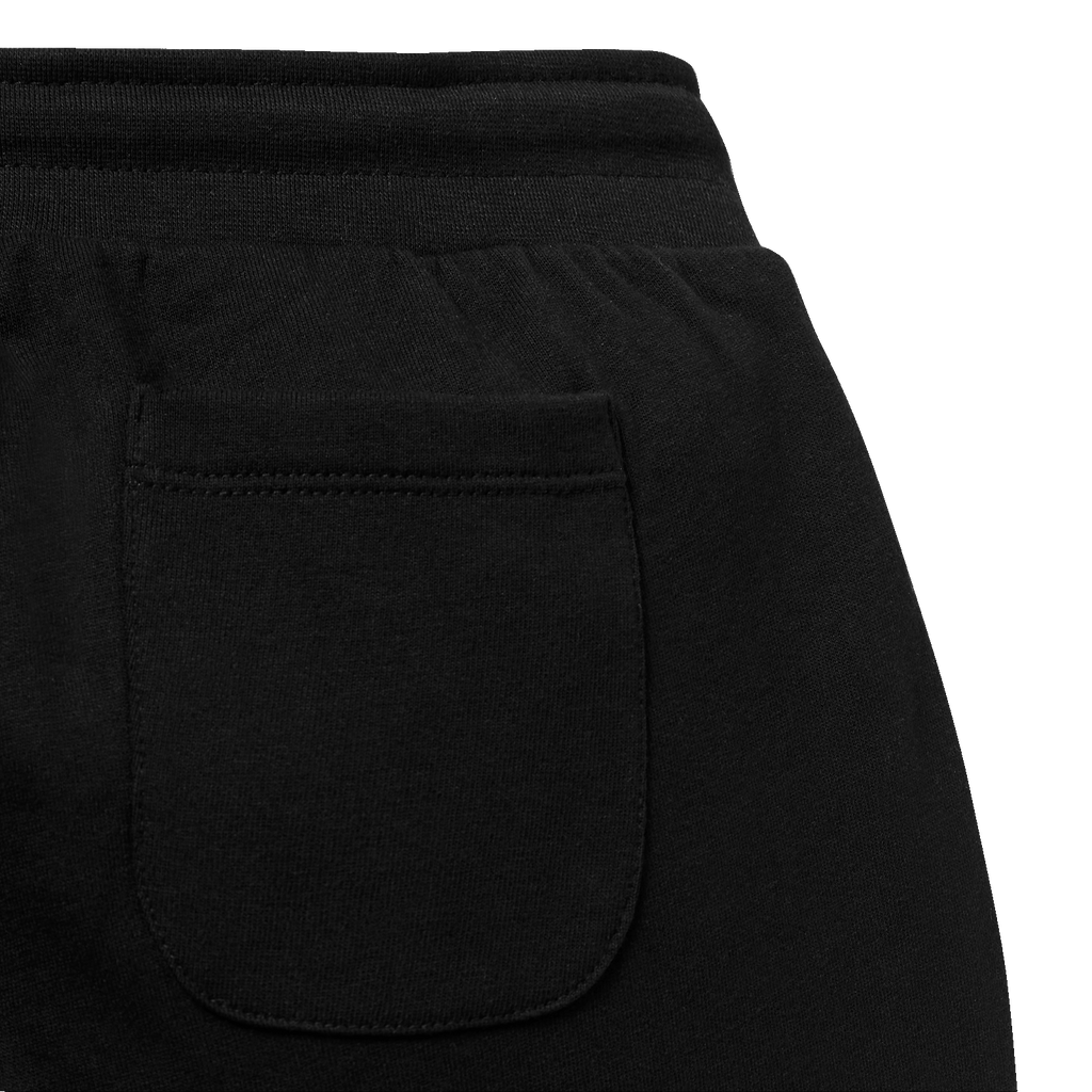 Vue détaillée d'un pantalon de survêtement noir du BVB pour enfants, doté d'une poche arrière apparente, idéal pour les supporters du Borussia Dortmund.