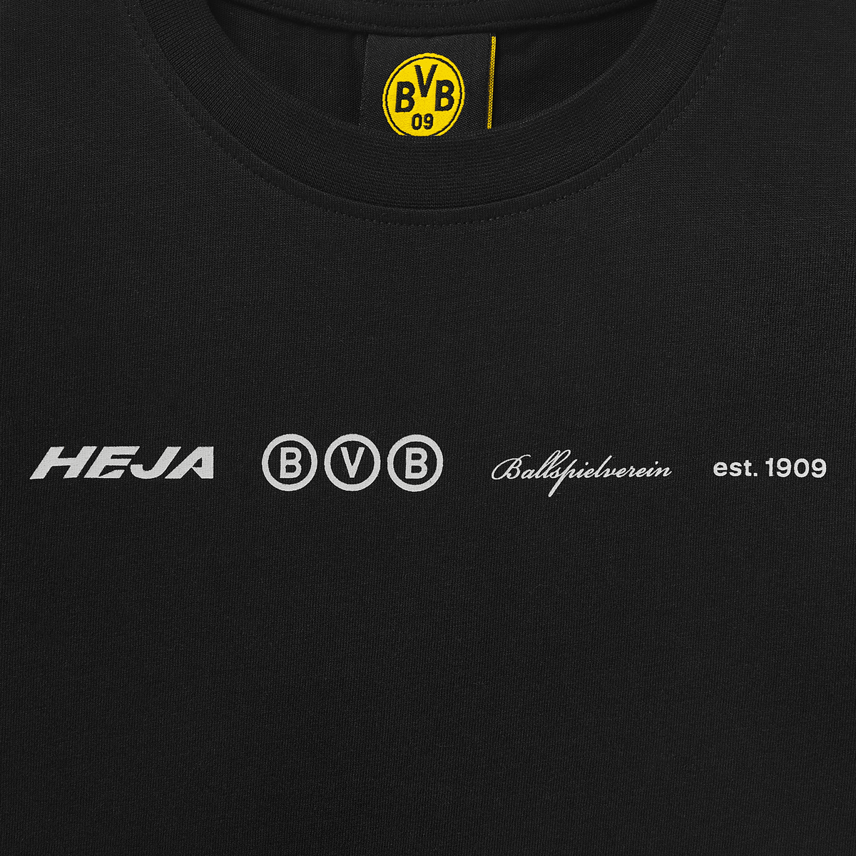 Maglietta nera del BVB per bambini dal taglio oversize, con le scritte bianche “Heja BVB”, “Ballspielverein”, “est. 1909” e il logo BVB 09.