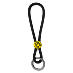 Porte-clés BVB en matière noire, orné d'un logo BVB-09 jaune bien visible et muni d'un anneau métallique robuste, idéal pour les supporters du Borussia Dortmund.