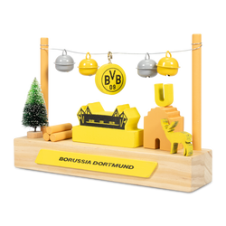 Decorative wooden display stand featuring a model of SIGNAL IDUNA PARK, the BVB logo, bells, and Christmas decorations in black and yellow—a Borussia Dortmund fan item.