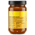 Das BVB Currywurst Sauce Glas, 310ml, mit gelbem Etikett und detaillierten Angaben zu Inhaltsstoffen und Nährwerten, passend für echte BVB-Fans.