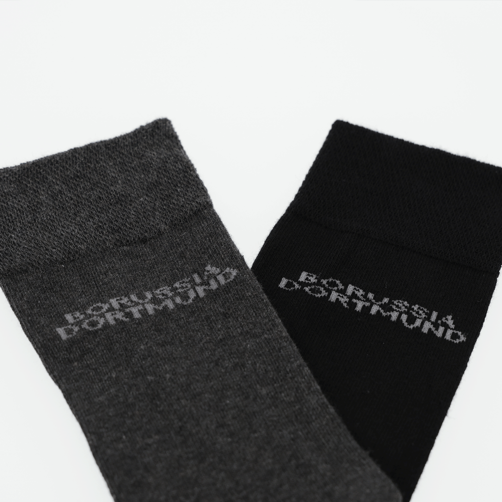 BVB-Socken 4er-Set in den Farben schwarz und grau mit Borussia Dortmund Schriftzug, ideales Fanaccessoire.