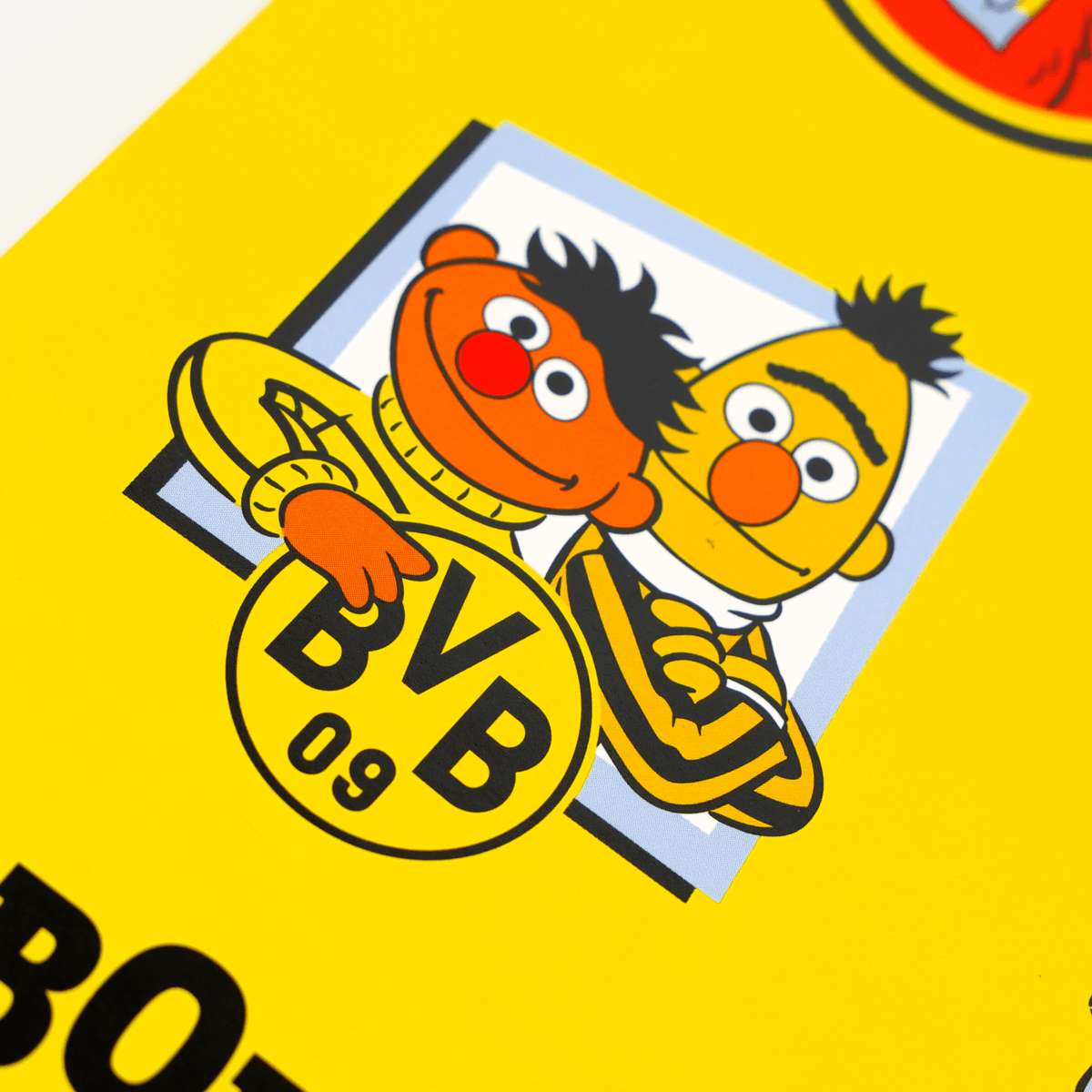 Borussia Dortmund sticker card featuring the Sesame Street characters Ernie and Bert against a yellow background with the BVB logo.