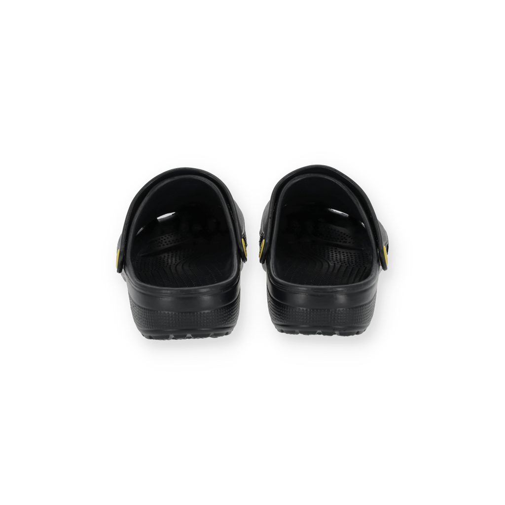 Vue arrière des sabots BVB noir et jaune arborant le logo du club, des chaussures confortables pour les supporters du Borussia Dortmund.