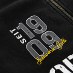 Veste zippée BVB-Elements 2025, noire, ornée d'une inscription jaune « Schwarz-Gelb » très voyante et du motif « Seit 1909 », idéale pour les supporters du Borussia Dortmund.
