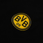 T-shirt noir « Iconic Lifestyle » du BVB, orné d'un emblème jaune bien visible « BVB 09 ». Gros plan sur le logo à l'avant du t-shirt.