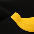 The BVB Iconic Lifestyle T-shirt in black and yellow, featuring a high-quality, contrasting collar, offers stylish fan apparel with a striking design.