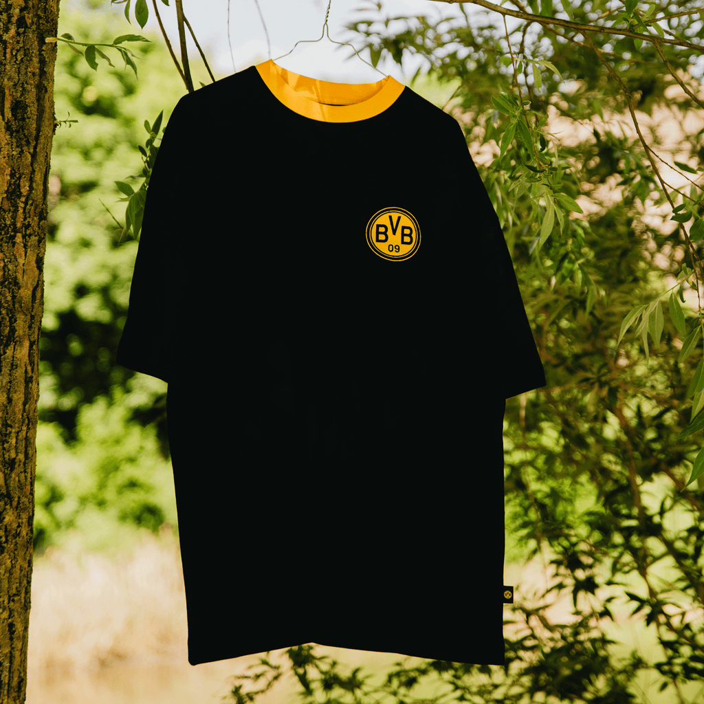 Black BVB Iconic Lifestyle T-shirt with a yellow collar and the BVB-09 logo on the chest, for Borussia Dortmund fans.