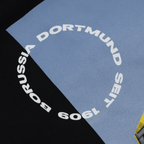 Giacca con zip nera e gialla del BVB "Matchday II" con stampa circolare "Borussia Dortmund dal 1909" (dettaglio). Ideale per i tifosi del Borussia Dortmund.