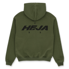 Green BVB Urban zip-up jacket, back view, with large black "HEJA BVB" lettering. Ideal as a fan item for Borussia Dortmund supporters.