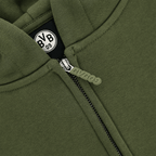 Close-up of a petrol-colored BVB Urban zip jacket with a visible BVB09 logo on the zipper.