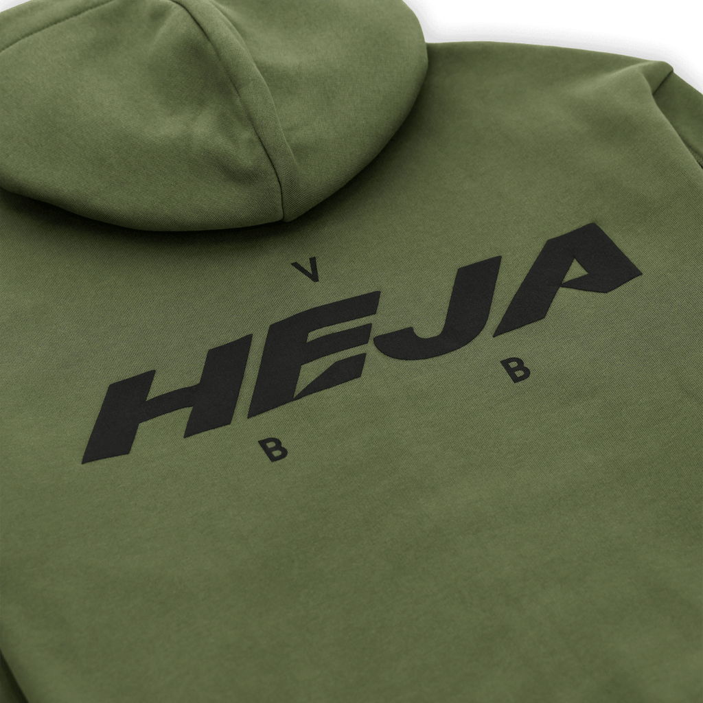 Green BVB hoodie with large black "HEJA" lettering and the BVB logo on the back. The perfect fan item for Borussia Dortmund fans.