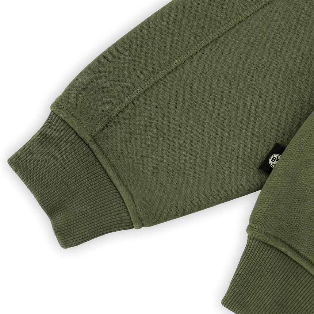 Green BVB Urban zip jacket with elastic cuffs and subtle brand logos; close-up view of the sleeve.