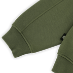 Green BVB Urban zip jacket with elastic cuffs and subtle brand logos; close-up view of the sleeve.